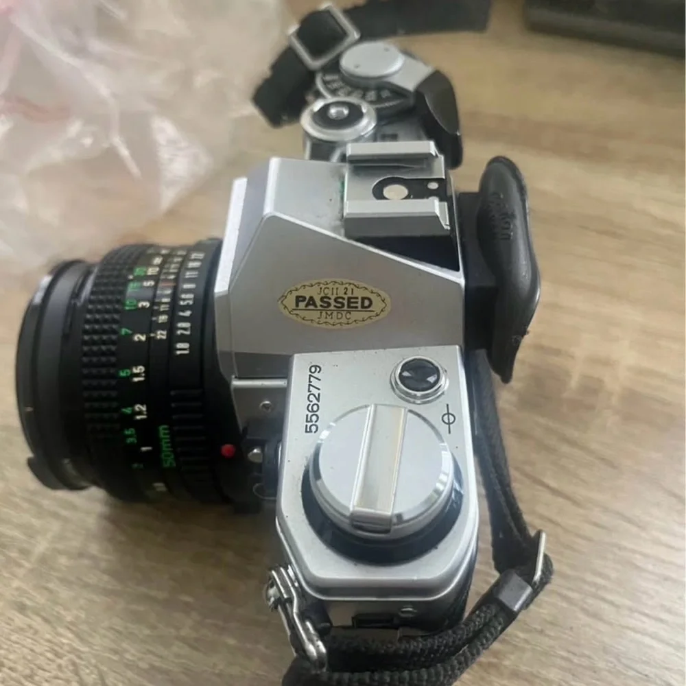 Canon AE-1 35mm Film Camera + 50mm + 70–210mm Lens Bundle